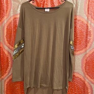 Sequin sleeve shirt.